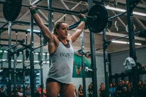 Invictus athlete doing a snatch in the CrossFit Open 18.3 workout.