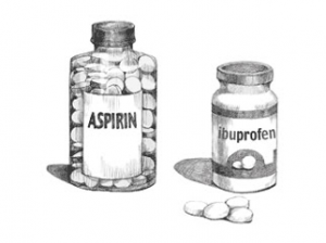 A bottle of aspirin and ibuprofen side by side.